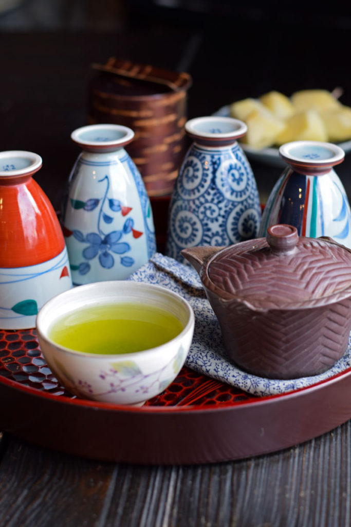 green tea with tea cups and kyusu tea pot