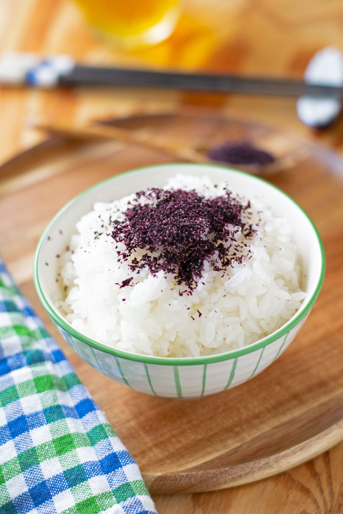 Red shiso furikake sprinkled over steamed white rice.