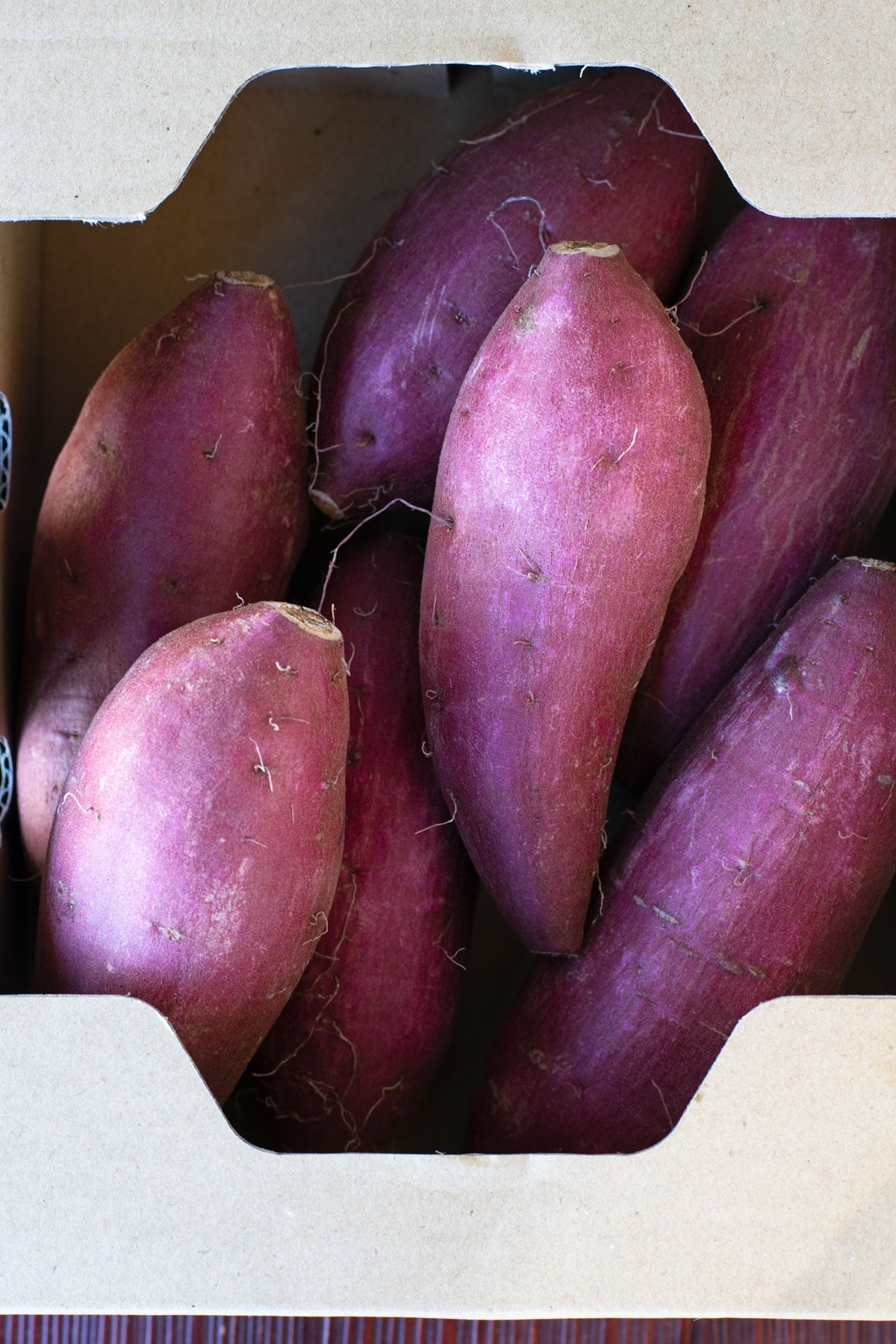 Satsumaimo sweet potatoes in a box.