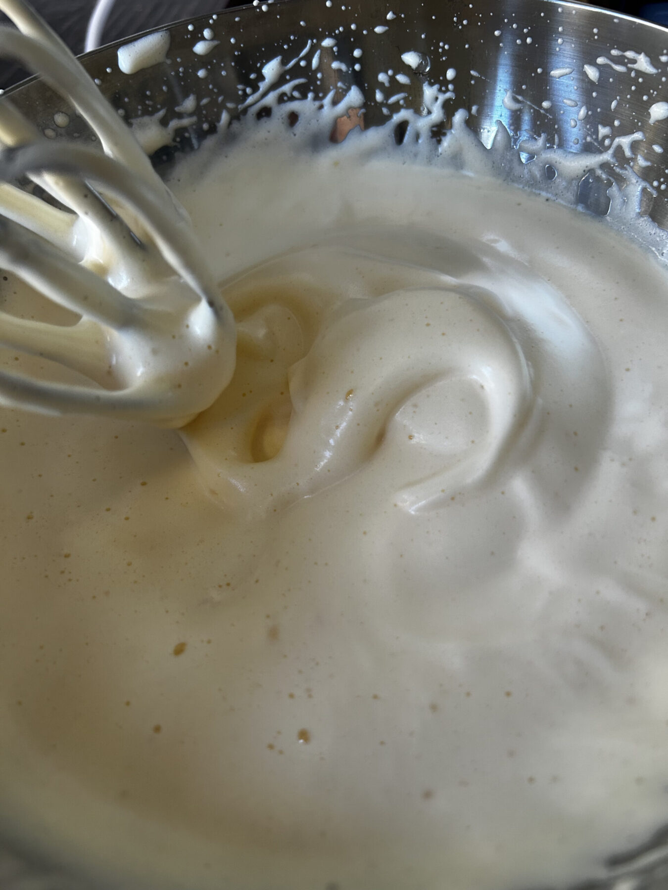 Yuzu cake batter with a figure-eight shape on top.