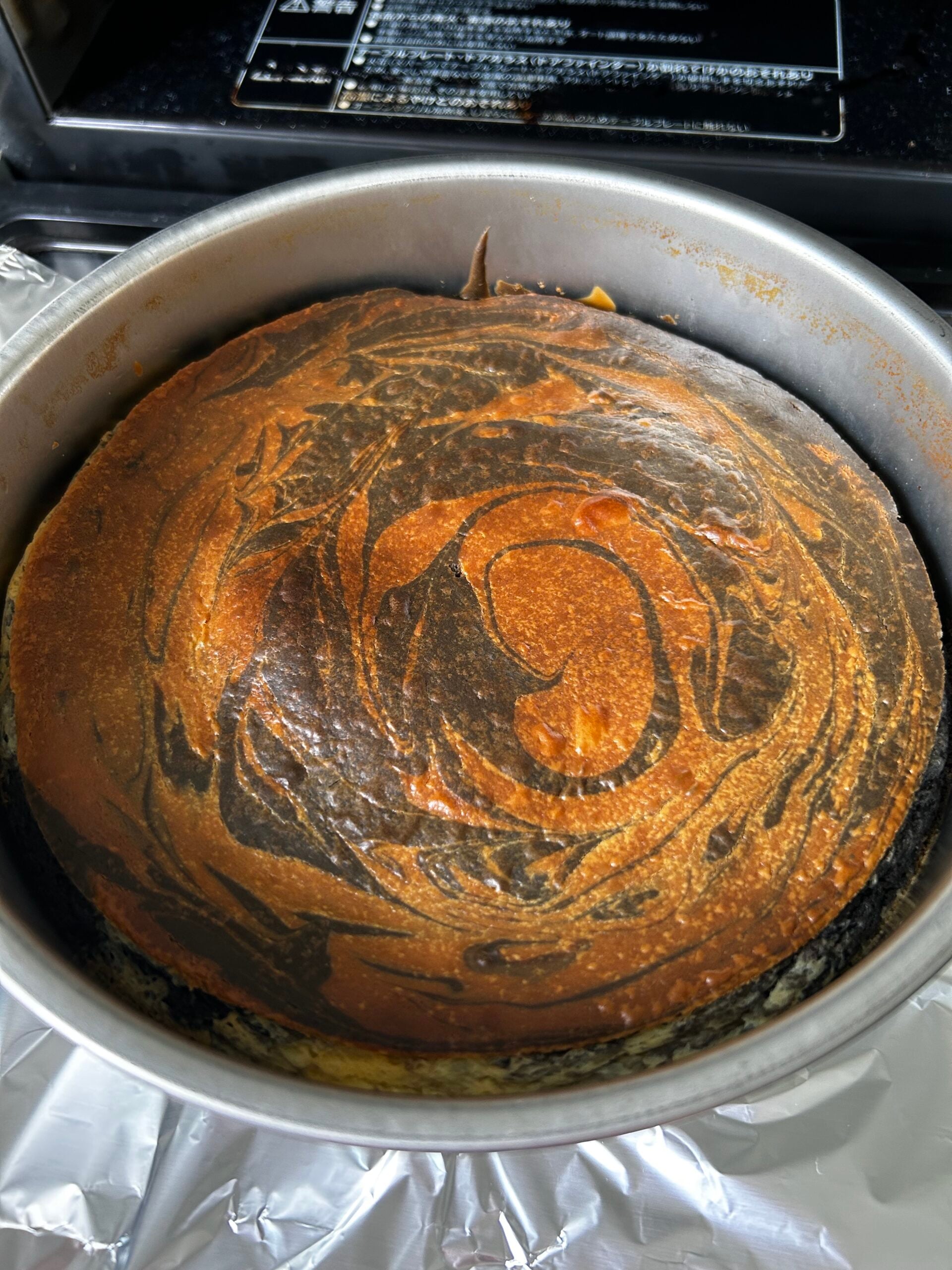 Over-browned black sesame marbled cheesecake.
